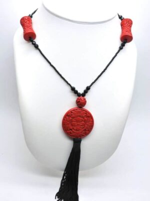 Necklace with red wooden locket